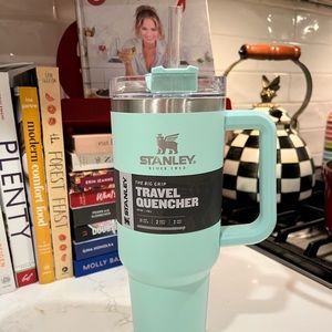 Brand new Stanley 40oz travel quencher in Mint with cover and straw